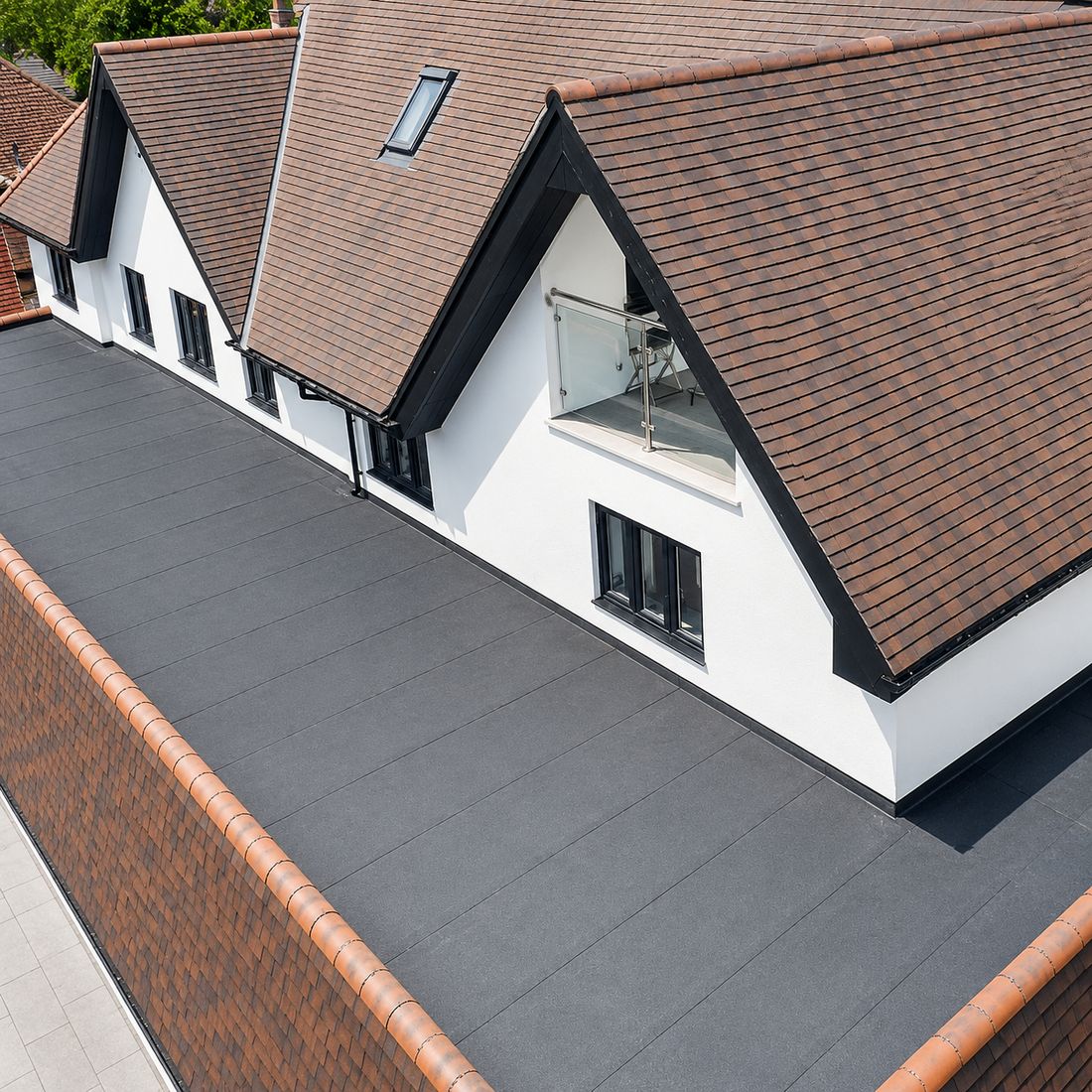 Tiled and flat roofs from above